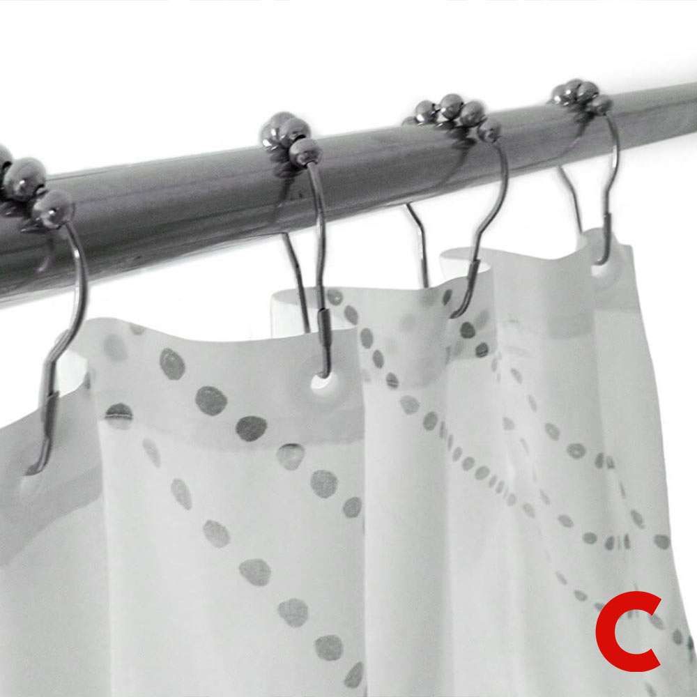 Close-up of chrome roller-ball hooks on a rail, holding a translucent shower curtain printed with grey dots