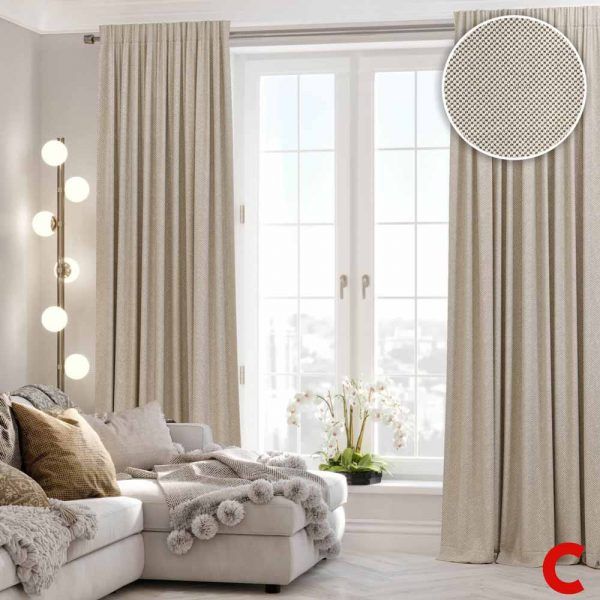 Oatmeal linen curtains at French windows above a grey corner sofa, with an inset circle magnifying the fabric weave
